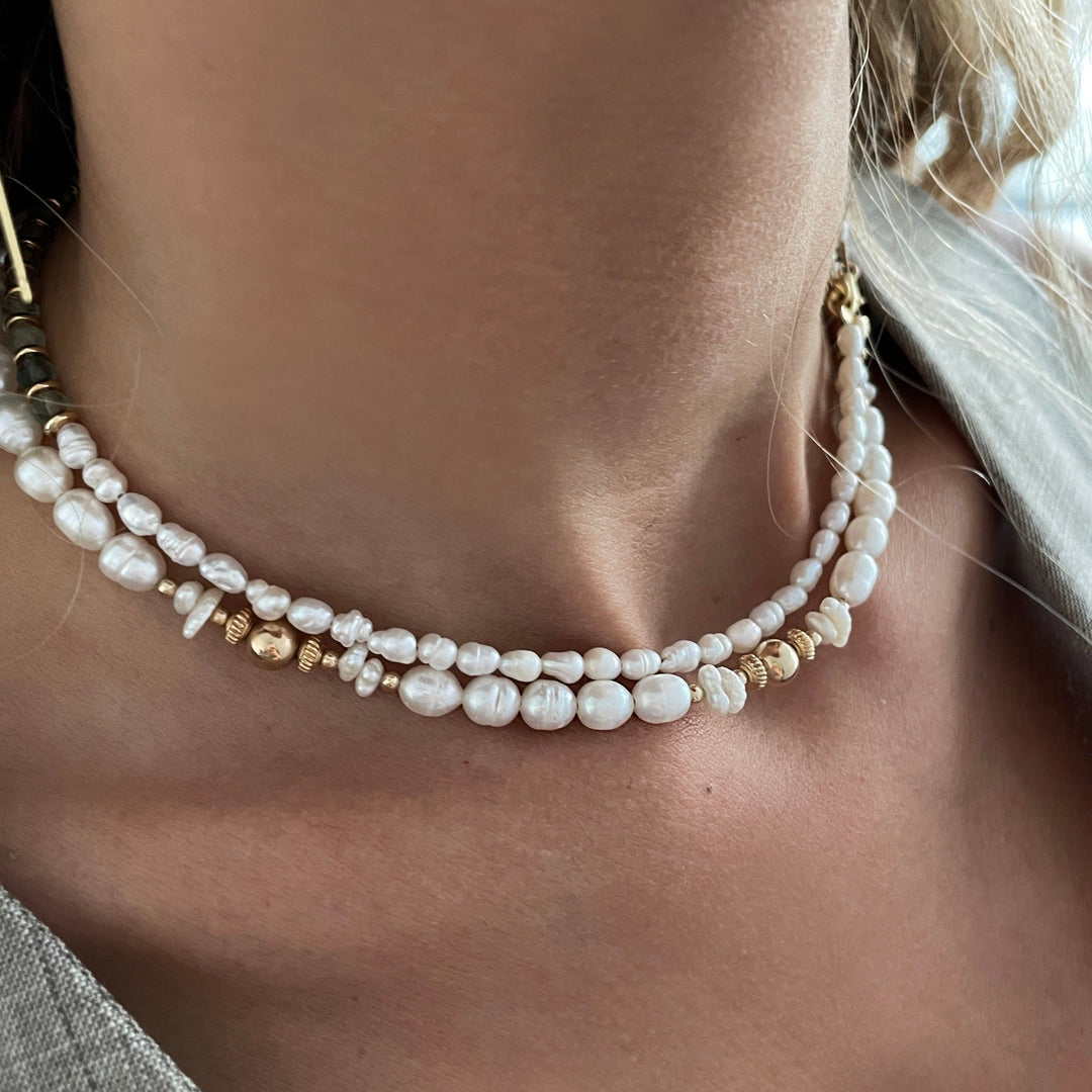 שרשרת פנינים וחרוזי זהב - טורי