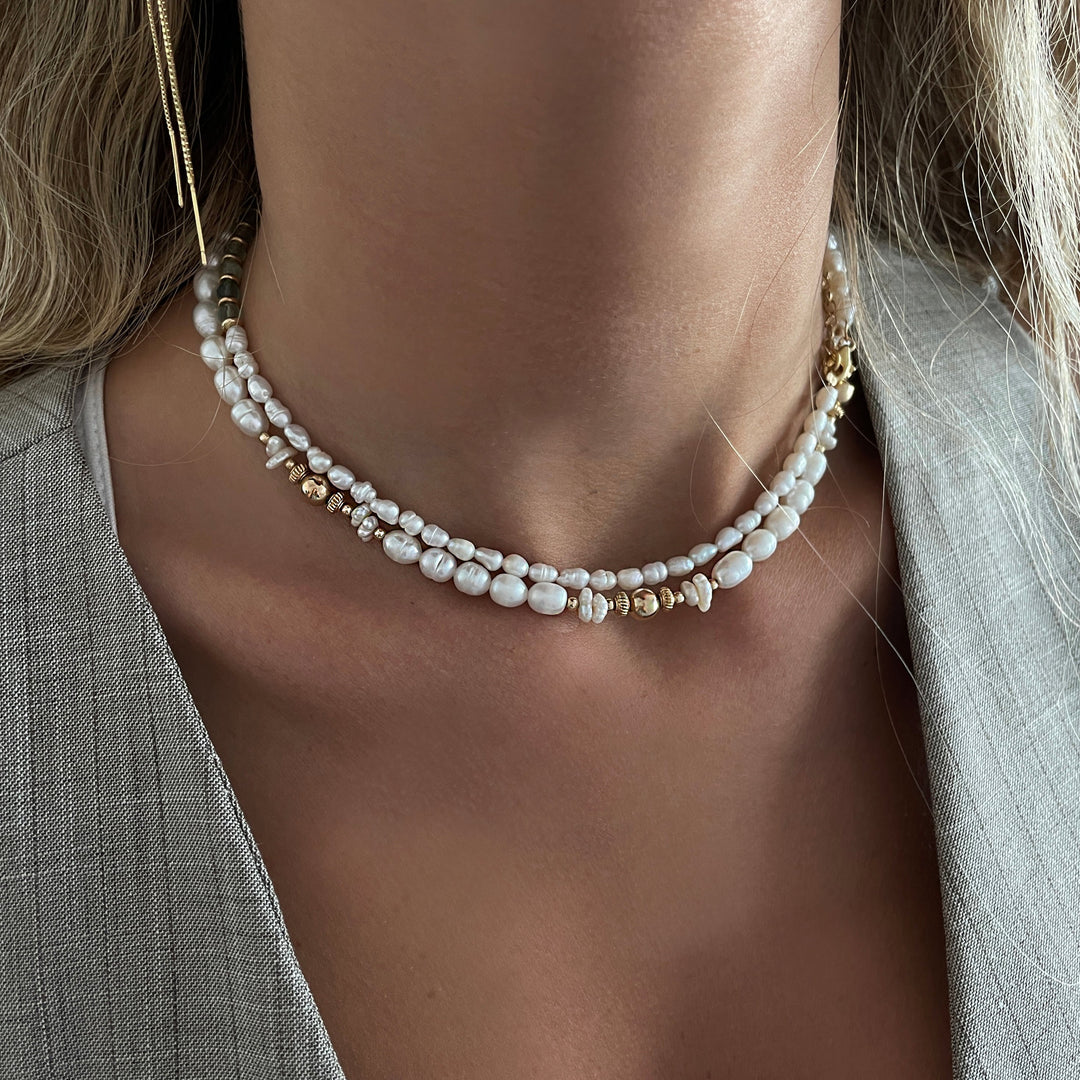 שרשרת פנינים וחרוזי זהב - טורי