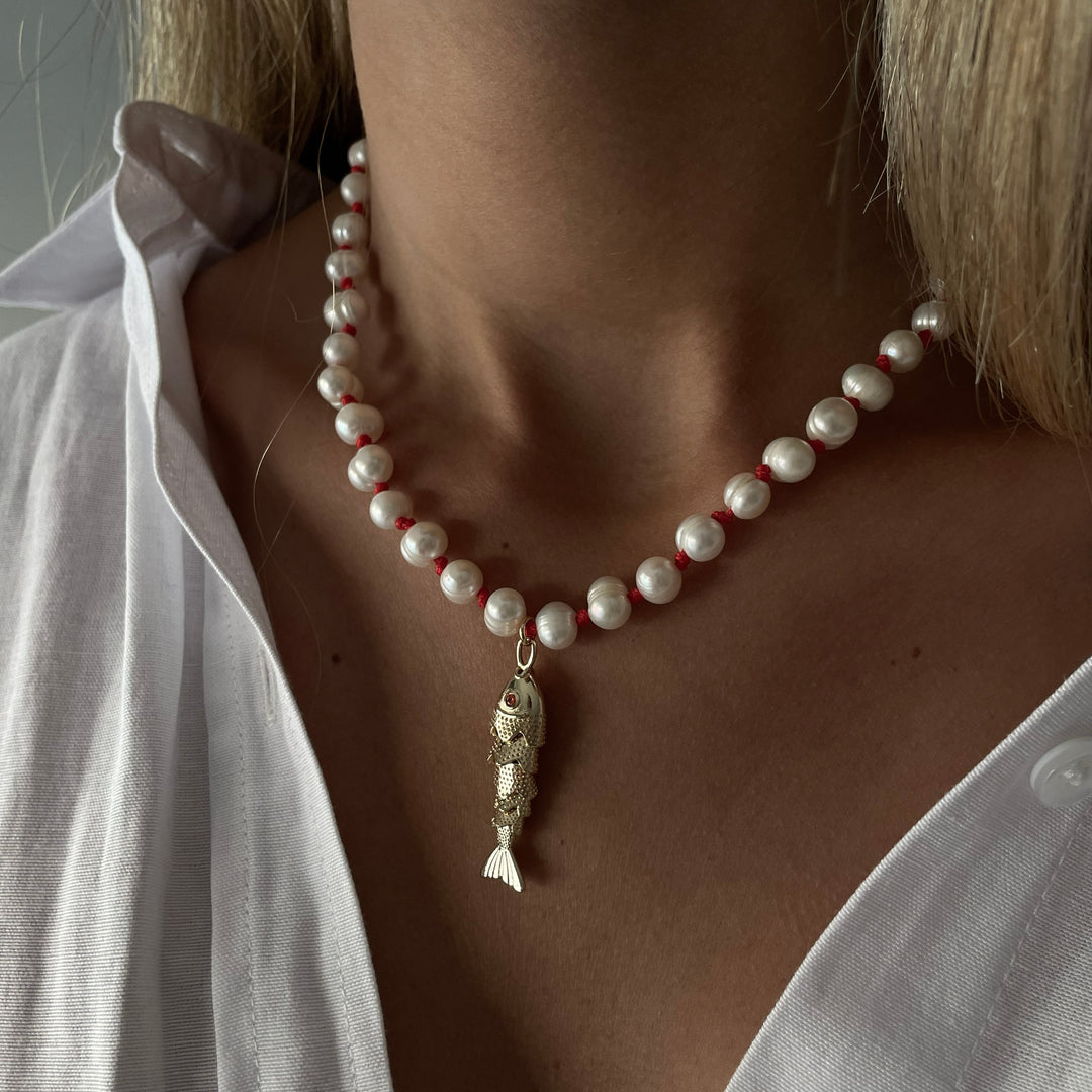 שרשרת פנינים ודג זהב - אליזה