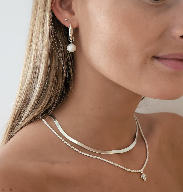 שרשראות כסף נחש ותליון לוטוס - דניס